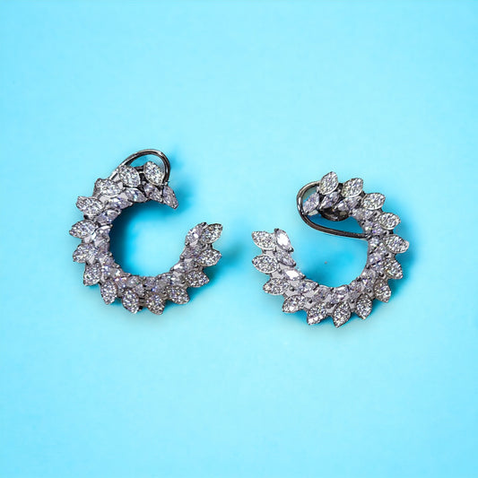 Kord store Rhodium plated Crescent shaped stud